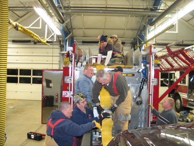 Mutliple companies assist with repacking 5&quot; on Engine 1 at Rising Sun's Station 8.